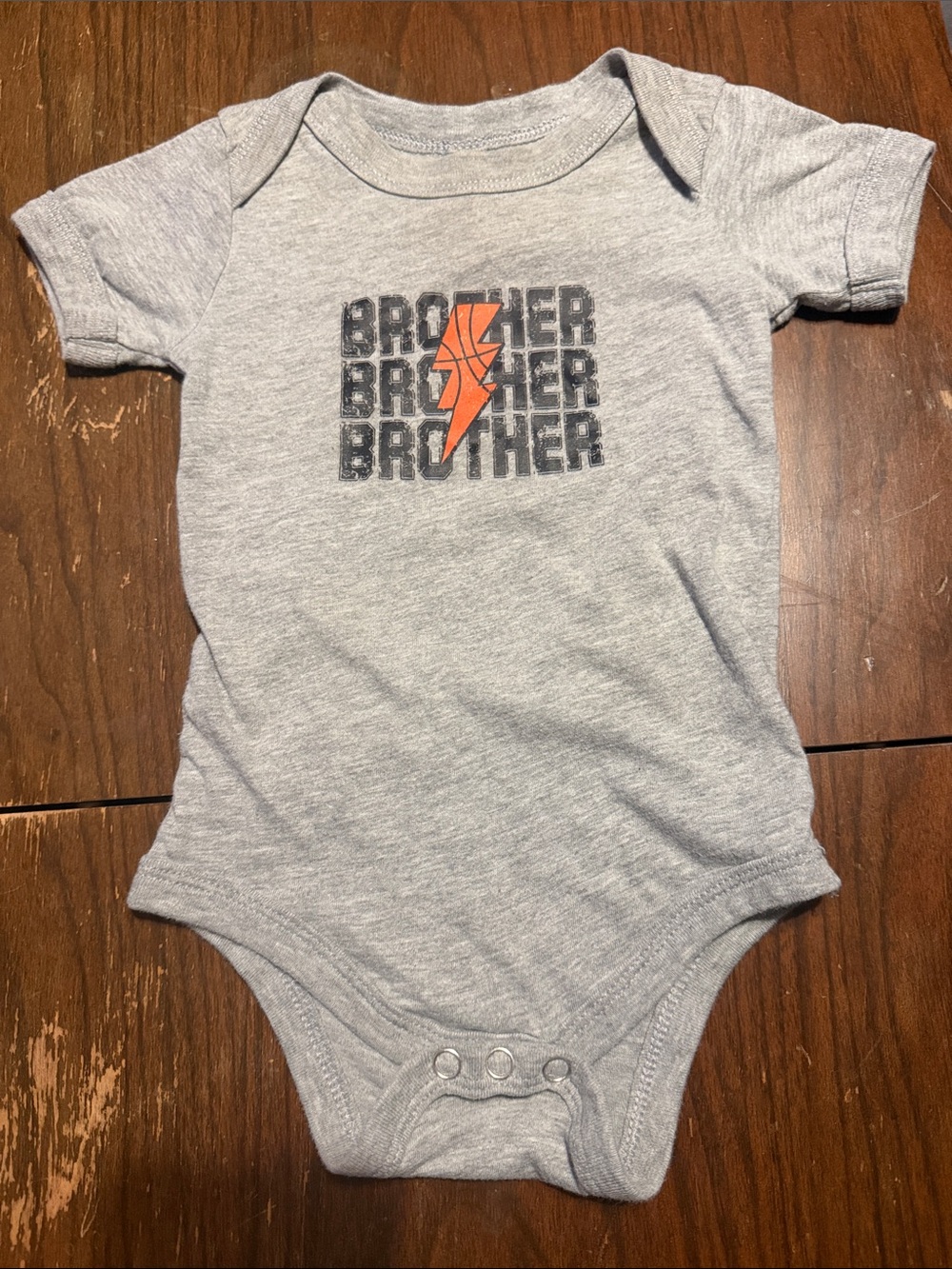 Bella Canvas Gray One-Piece Bodysuit with Orange Lightning Graphic